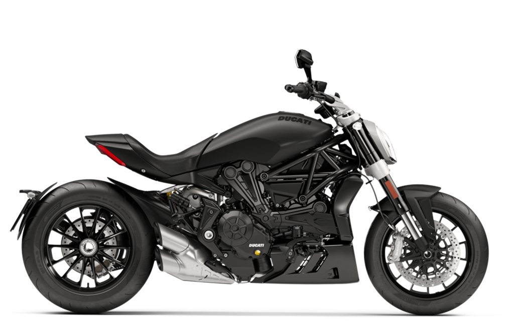 Et billede, der indeholder motorcykel, parkeret, sort, slv

Automatisk genereret beskrivelse