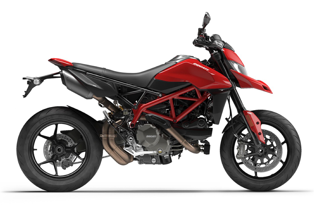 Et billede, der indeholder motorcykel, parkeret, sort, rd

Automatisk genereret beskrivelse