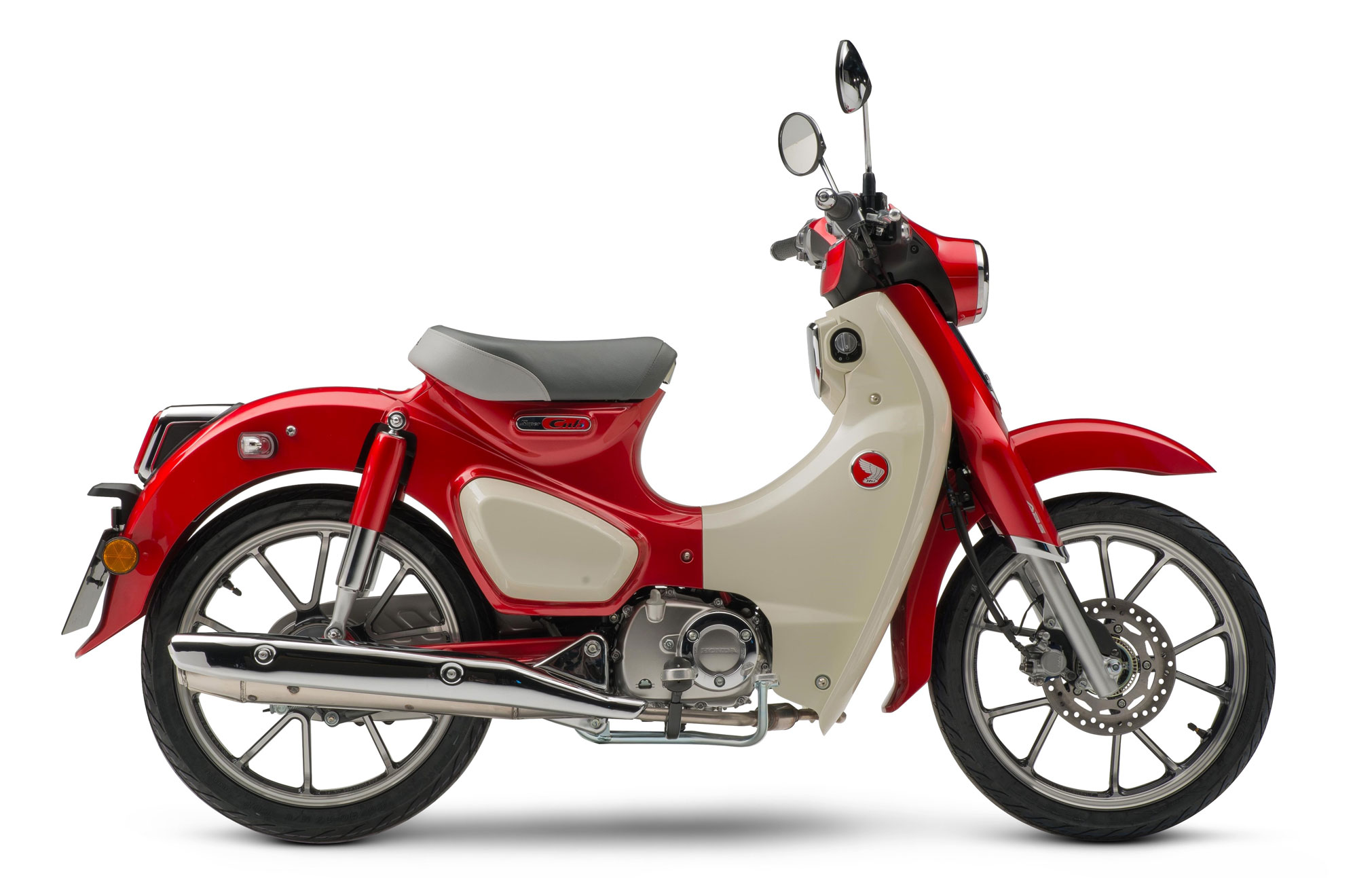 Et billede, der indeholder motorcykel, parkeret, rd, udendrs

Automatisk genereret beskrivelse
